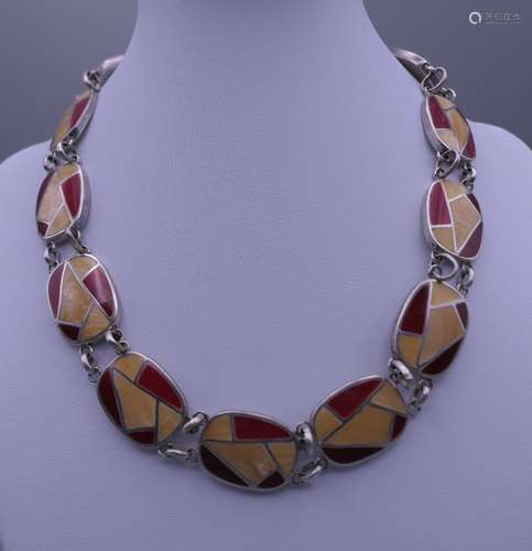 A silver red enamel and mother-of-pearl necklace. 42 cm long...