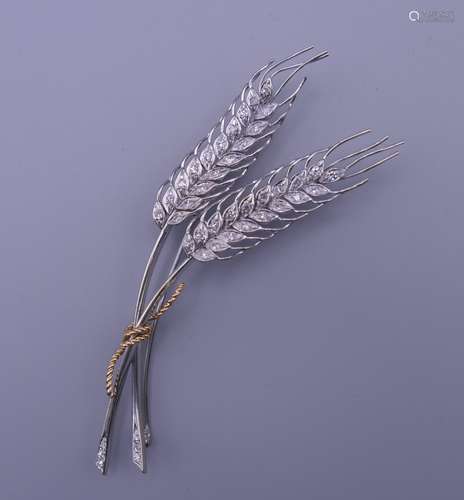 An 18 ct gold diamond set wheatsheaf brooch. 9.5 cm high. 14...