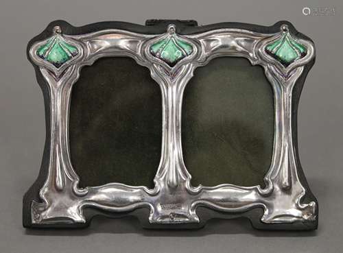 An Art Nouveau style silver double photograph frame. 11 cm w...