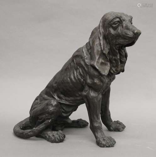 A bronze model of a dog. 35 cm high.