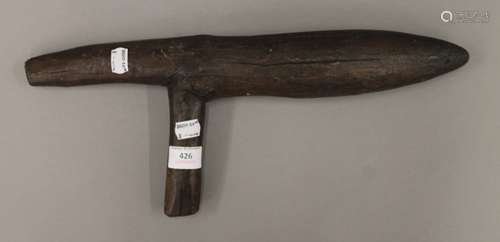 An antique treen tool, possibly a potato dibber. 43 cm long.