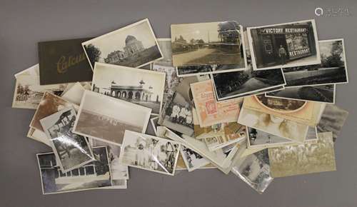 A quantity of vintage postcards.