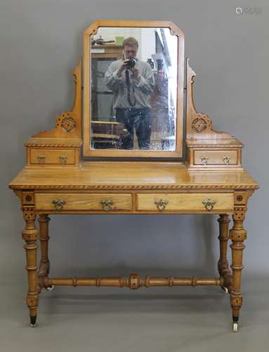 An Arts and Crafts inlaid ash dressing table, en-suite (see ...