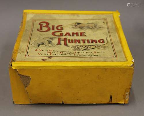 A vintage boxed Big Game Hunting mechanical toy. The box 20 ...