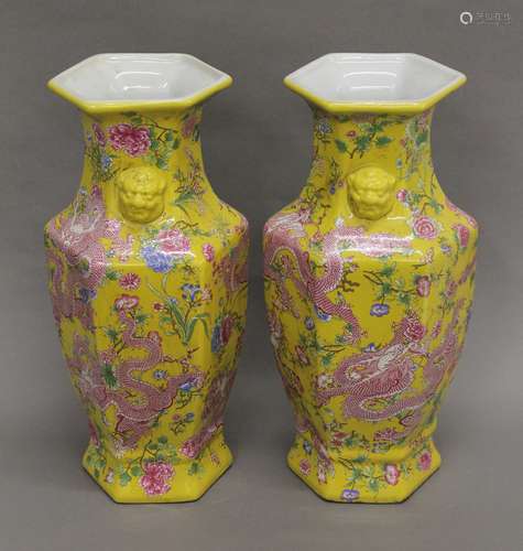 A pair of Chinese porcelain hexagonal yellow ground vases de...