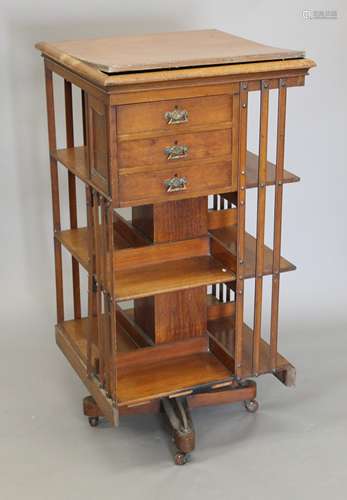 A Victorian mahogany revolving bookcase. 120 cm high.