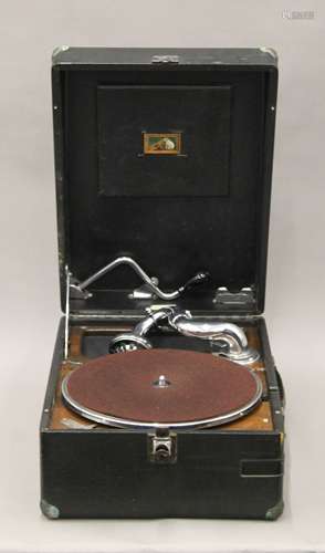 A H.M.V. portable gramophone.