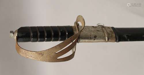 A sword in scabbard. 90 cm long.