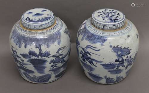 A pair of Chinese blue and white porcelain ginger jars. 27 c...