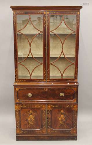 A 19th century inlaid mahogany secretaire bookcase. 208 cm h...