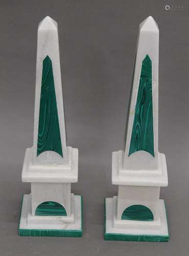 A pair of white and green obelisks. 43 cm high.