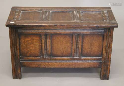 A small early 20th century oak coffer. 67 cm wide.