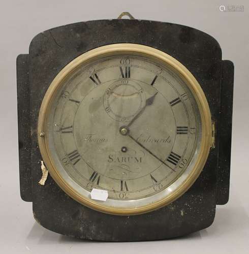 An oak cased wall clock with earlier movement,