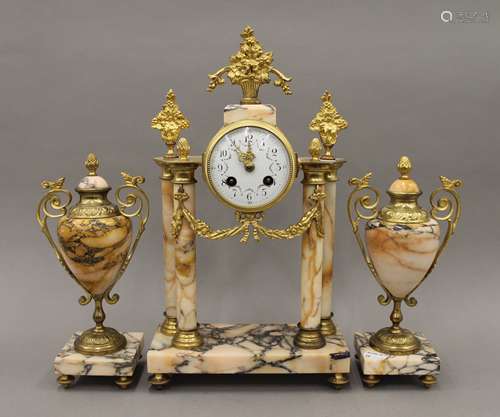 A marble and ormolu clock garniture with pendulum and key, w...