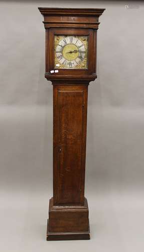 A Georgian oak longcase clock with silvered dial. 191.5 cm h...