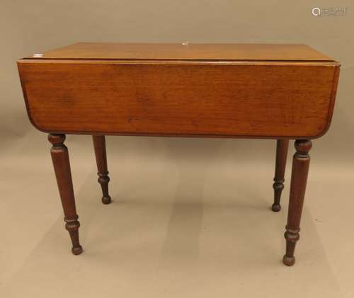 A Victorian mahogany Pembroke table. 87 cm long.