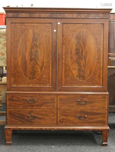 A 19th century mahogany linen press. 183 cm high x 142.5 cm ...