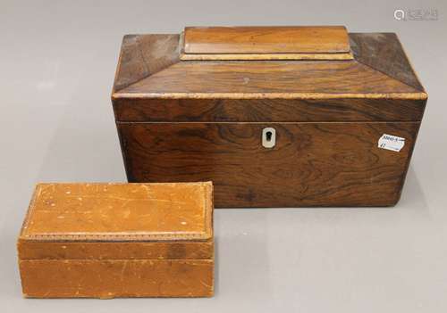 A Victorian rosewood tea caddy and a small leather box. The ...