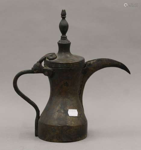 An antique Ottoman brass ewer. 30.5 cm high.