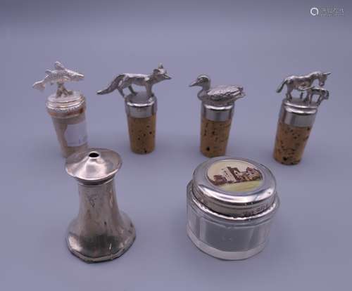 Four cork bottle stoppers,