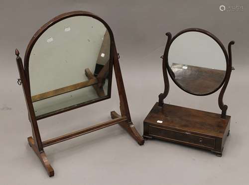 Two 19th century mahogany toilet mirrors.