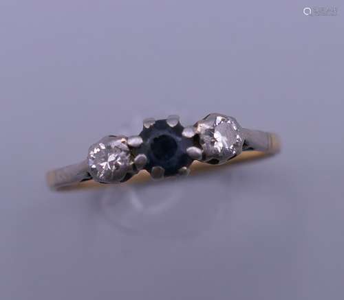 An 18 ct gold sapphire and diamond ring. Ring size P/Q.