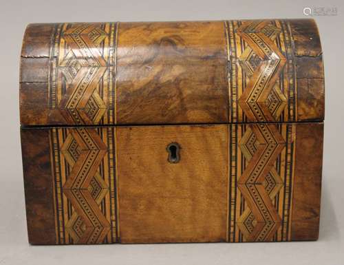 A Victorian inlaid walnut dome topped tea caddy. 20 cm wide.