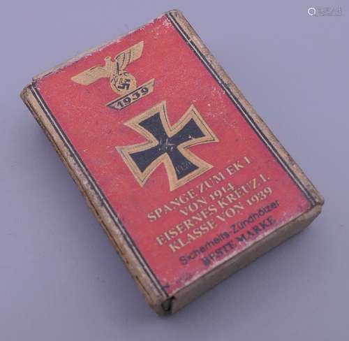 A WWII period Nazi matchbox. 5 x 3.75 cm.