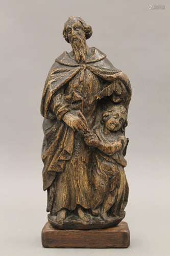 A 17th century Flemish religious carving on later base. 29 c...