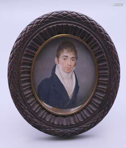 A Georgian portrait miniature, in oval frame. Frame 10 cm x ...