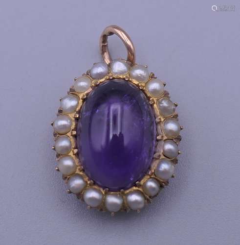 A gold, amethyst and pearl pendant. 2 cm x 1.5 cm.