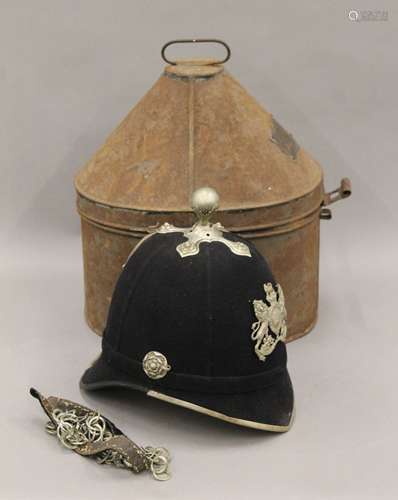 A Victorian Policeman's helmet in toleware tin. 34 cm high o...