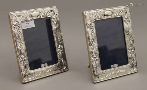 A pair of Art Nouveau style silver photograph frames. 14 x 1...