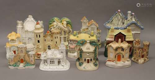 A quantity of various 19th century Staffordshire cottages, e...