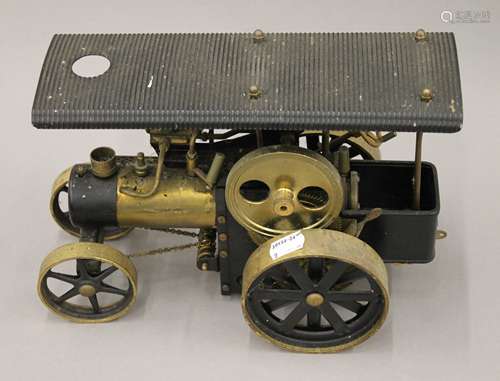 A Wilesco model traction engine. 27 cm long.