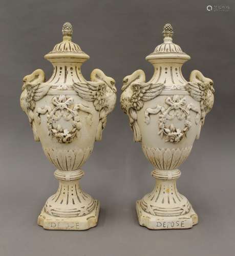 A pair of late 19th/early 20th century French plaster vases....