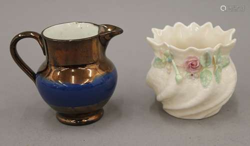 A Belleek vase and a copper lustre jug. The former 6.5 cm hi...