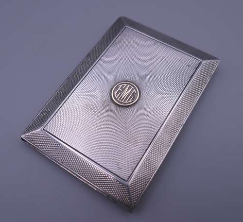 A silver cigarette case, hallmarked Asprey, London. 8.5 x 6 ...