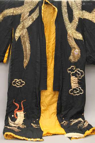 A Chinese embroidered robe.