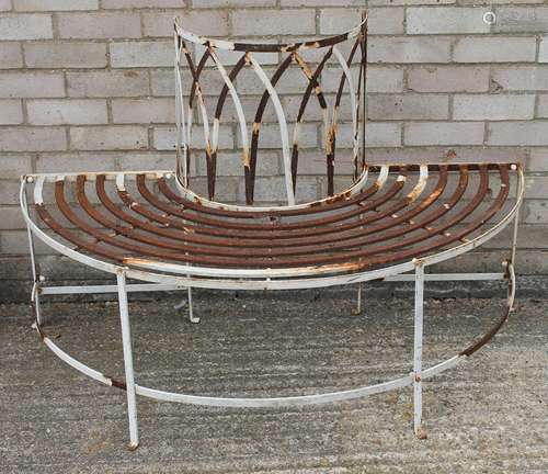 A metal half tree garden bench