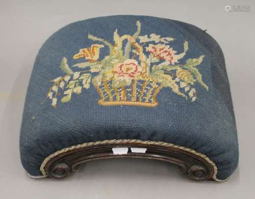 A Victorian upholstered foot stool.