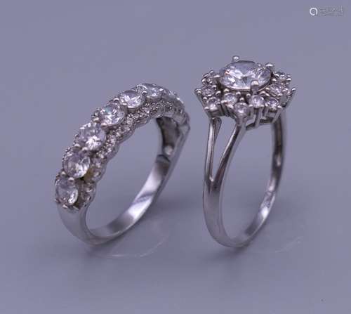 Two cubic zirconia rings.