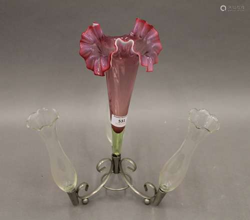 A cranberry and clear glass epergne. 31.5 cm high.