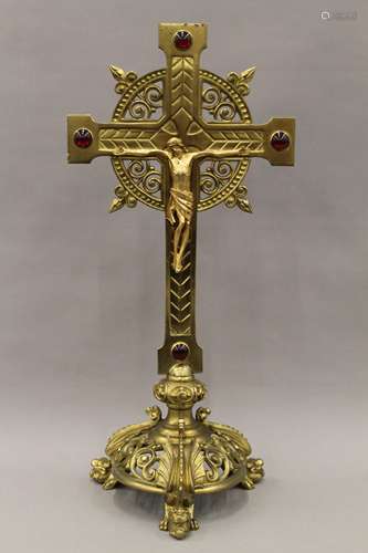 A 19th century brass crucifix. 51 cm high.