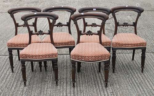 A set of six Victorian mahogany dining chairs.