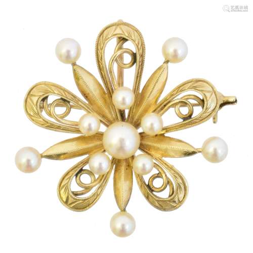 A cultured pearl brooch by Mikimoto
