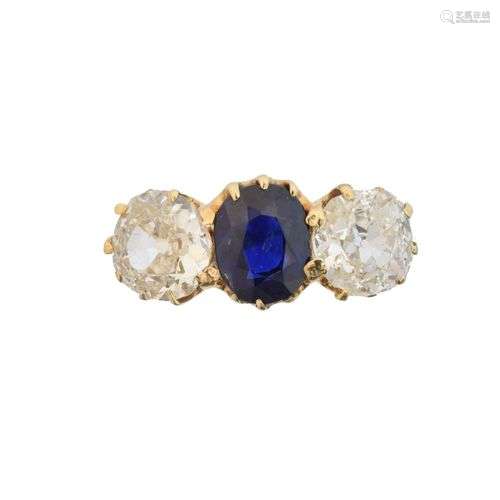 A sapphire and diamond three stone ring,