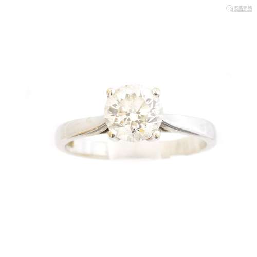 An 18ct gold diamond single stone ring,