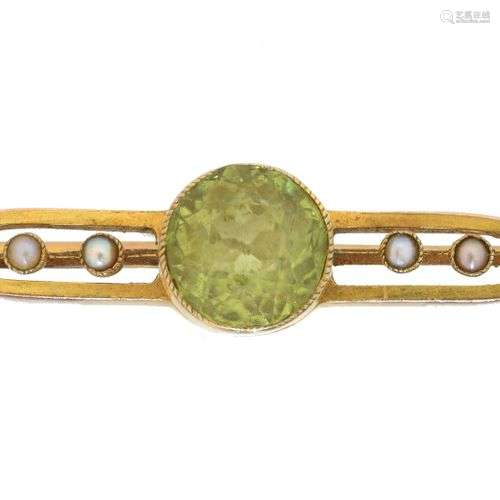 An early 20th century peridot and seed pearl brooch,