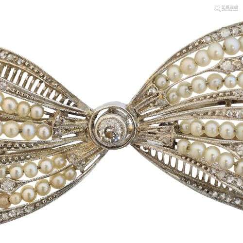 An early 20th century diamond and pearl brooch,
